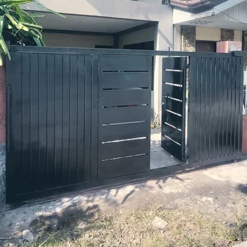 Modern black steel sliding gate installed for a Karen residence